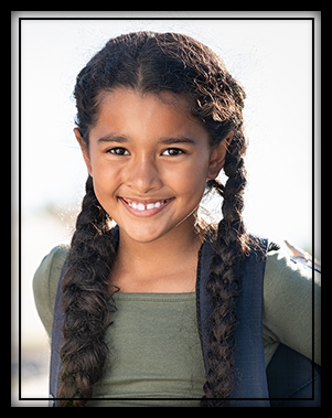 young smiling girl with a backpack